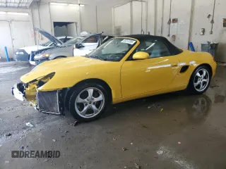2001 Porsche Boxster z VIN WP0CA29831U621709, wystawiony jako Copart lot #58237285 z przebiegiem 167 716 mil mil oraz Szkoda całkowita • Salvage title. Historia ofert i sprzedaży dostępna na DreamBid. Obrazek 1.