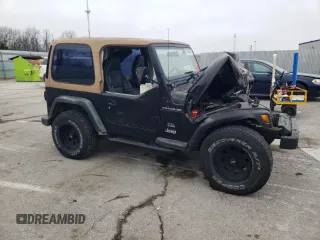 2000 Jeep Wrangler SE with VIN 1J4FA29PXYP746021, listed as a Copart auction lot 51023485 with 0 mi miles and Salvage Title. Bid and sale history available at carsss.com. Image 4.