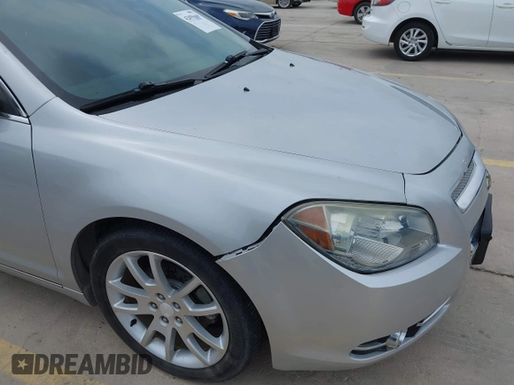 2012 Chevrolet Malibu LTZ with VIN 1G1ZG5E72CF313664, listed as a IAAI auction lot 42055669 with 97,053 mi miles and . Bid and sale history available at DreamBid. Image 6.