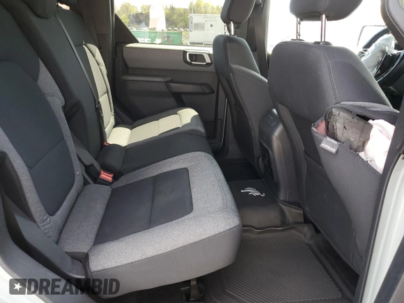 2021 Ford Bronco with VIN 1FMDE5BH0MLA87532, listed as a Copart auction lot 54229225 with 35,741 mi miles and Salvage title. Bid and sale history available at DreamBid. Image 11.