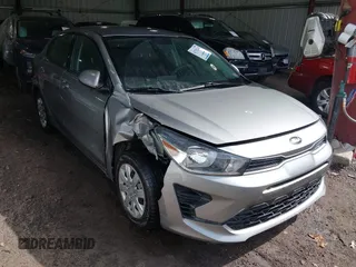 2021 Kia Rio LX with VIN 3KPA24AD1ME391454, listed as a IAAI auction lot 41732365 with 69,888 mi miles. Bid and sale history available at carsss.com. Image 1.
