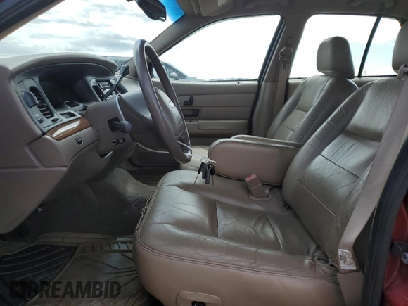 2003 Ford Crown Victoria LX z VIN 2FAFP74W43X100336, wystawiony jako Copart lot #51004035 z przebiegiem 82 089 mil mil oraz Szkoda całkowita • Salvage title. Historia ofert i sprzedaży dostępna na DreamBid. Obrazek 7.