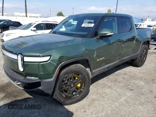2023 Rivian R1T Adventure with VIN 7FCTGAAA9PN018171, listed as a Copart auction lot 72593614 with 12,553 mi miles and Salvage Title. Bid and sale history available at carsss.com. Image 1.