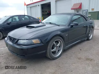 2001 Ford Mustang GT Deluxe с VIN 1FAFP45X71F225880, выставлен на аукционе IAAI как лот 42788411 с пробегом 45 503 миль миль и . История ставок и продаж доступна на DreamBid. Изображение 2.