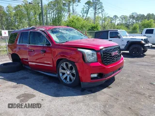 2015 GMC Yukon Denali z VIN 1GKS1CKJ2FR270403, wystawiony jako IAAI lot #42027140 z przebiegiem 209 271 mil mil oraz . Historia ofert i sprzedaży dostępna na DreamBid. Obrazek 1.
