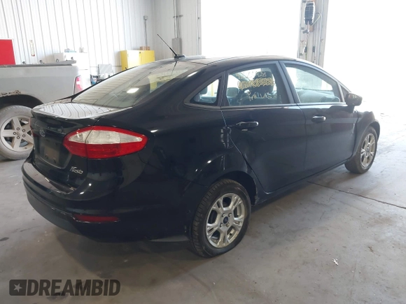 2016 Ford Fiesta SE z VIN 3FADP4BJ5GM151066, wystawiony jako IAAI lot #42200928 z przebiegiem 105 004 mil mil oraz . Historia ofert i sprzedaży dostępna na DreamBid. Obrazek 4.