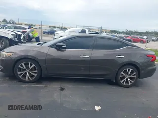 2017 Nissan Maxima SL with VIN 1N4AA6AP0HC367139, listed as a IAAI auction lot 42754080 with 142,731 mi miles and . Bid and sale history available at DreamBid. Image 14.