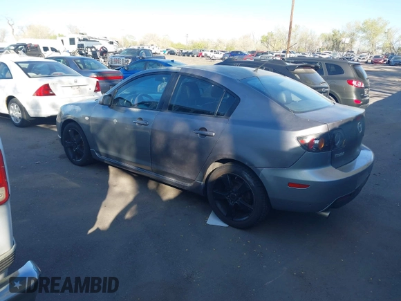 2005 Mazda 3 s with VIN JM1BK323351252581, listed as a IAAI auction lot 42012813 with 173,763 mi miles. Bid and sale history available at carsss.com. Image 3.
