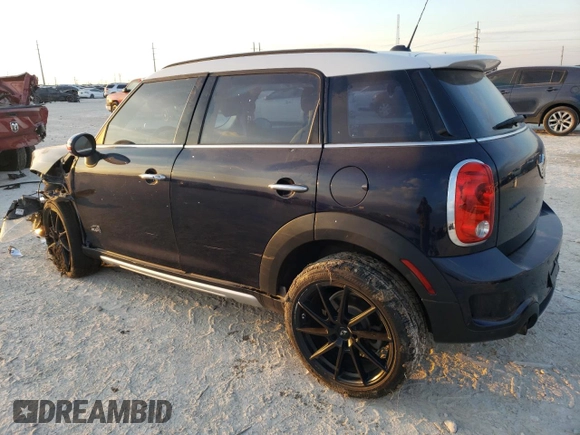 2015 MINI Countryman S with VIN WMWZC5C57FWP48606, listed as a Copart auction lot 47212255 with 104,922 mi miles and Salvage Title. Bid and sale history available at DreamBid. Image 2.