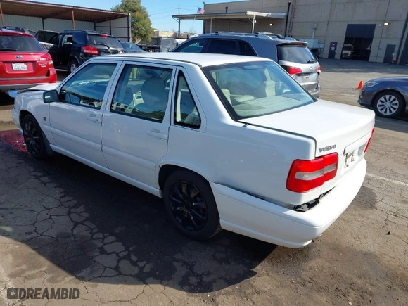 1999 Volvo S70 with VIN YV1LS55A8X1580392, listed as a IAAI auction lot 41623528 with 77,806 mi miles. Bid and sale history available at carsss.com. Image 3.