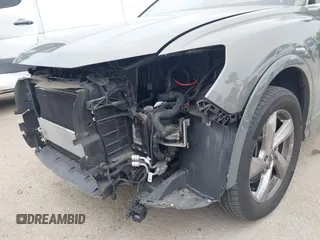 2020 Audi Q3 Premium z VIN WA1AECF32L1061271, wystawiony jako IAAI lot #42038795 z przebiegiem 23 902 mil mil oraz . Historia ofert i sprzedaży dostępna na DreamBid. Obrazek 18.
