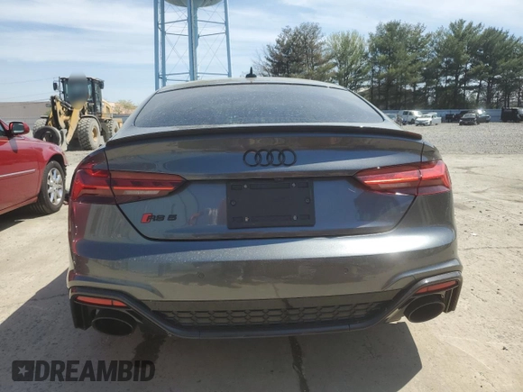 2023 Audi RS 5 Sportback z VIN WUAAWCF55PA902979, wystawiony jako Copart lot #54194715 z przebiegiem 9 576 mil mil oraz Szkoda całkowita • Salvage title. Historia ofert i sprzedaży dostępna na DreamBid. Obrazek 6.