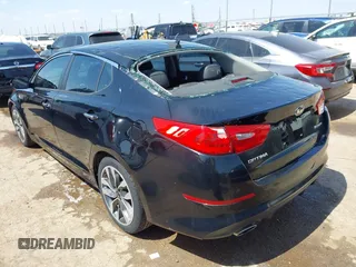 2015 Kia Optima SXL Turbo with VIN 5XXGR4A63FG370493, listed as a IAAI auction lot 42540013 with 61,297 mi miles and . Bid and sale history available at DreamBid. Image 3.