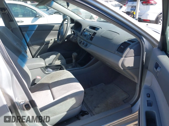 2004 Toyota Camry LE with VIN 4T1BE32K74U350908, listed as a IAAI auction lot 42099989 with 120,971 mi miles. Bid and sale history available at carsss.com. Image 5.