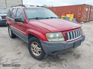 2004 Jeep Grand Cherokee Laredo with VIN 1J4GX48S14C259215, listed as a IAAI auction lot 41906121 with 142,668 mi miles. Bid and sale history available at carsss.com. Image 1.
