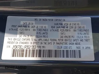 2024 Mazda CX-5 S Carbon Edition z VIN JM3KFBCLXR0521353, wystawiony jako IAAI lot #42351444 z przebiegiem 17 270 mil mil oraz . Historia ofert i sprzedaży dostępna na DreamBid. Obrazek 9.