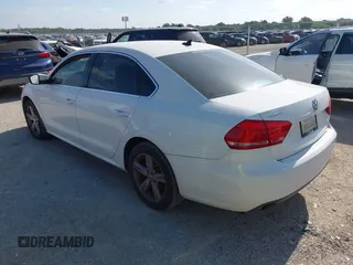 2014 Volkswagen Passat Wolfsburg Edition with VIN 1VWAS7A30EC053025, listed as a IAAI auction lot 42579059 with 168,446 mi miles and . Bid and sale history available at DreamBid. Image 3.