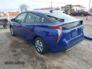 2018 Toyota Prius Two with VIN JTDKARFU3J3547008, listed as a IAAI auction lot 41804861 with 125,946 mi miles. Bid and sale history available at carsss.com. Image 3.