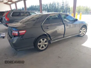2009 Toyota Camry LE z VIN 4T1BK46K09U592438, wystawiony jako IAAI lot #42078810 z przebiegiem 164 582 mil mil oraz . Historia ofert i sprzedaży dostępna na DreamBid. Obrazek 4.