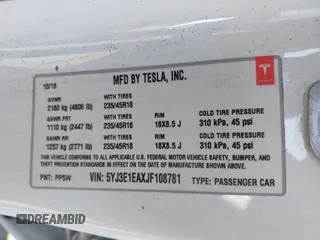 2018 Tesla Model 3 Long Range Battery with VIN 5YJ3E1EAXJF108781, listed as a IAAI auction lot 41962628 with 61,208 mi miles and . Bid and sale history available at DreamBid. Image 9.