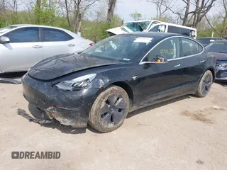 2018 Tesla Model 3 Long Range Battery z VIN 5YJ3E1EB2JF103096, wystawiony jako IAAI lot #42016324 z przebiegiem 143 247 mil mil oraz . Historia ofert i sprzedaży dostępna na DreamBid. Obrazek 18.