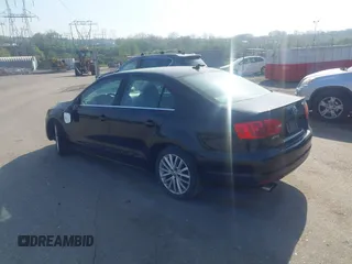 2013 Volkswagen Jetta TDI w/Premium with VIN 3VWLL7AJ5DM390579, listed as a IAAI auction lot 42112031 with 134,995 mi miles and . Bid and sale history available at DreamBid. Image 3.