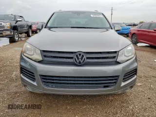 2011 Volkswagen Touareg Sport z VIN WVGFK9BP5BD001915, wystawiony jako Copart lot #58965625 z przebiegiem 181 765 mil mil oraz Szkoda całkowita • Salvage title. Historia ofert i sprzedaży dostępna na DreamBid. Obrazek 5.