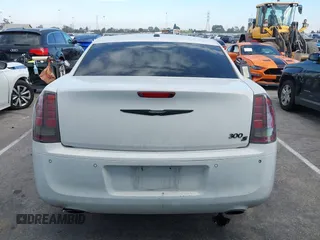 2014 Chrysler 300 S z VIN 2C3CCABG5EH344712, wystawiony jako IAAI lot #41594011 z przebiegiem 173 310 mil mil oraz . Historia ofert i sprzedaży dostępna na DreamBid. Obrazek 16.