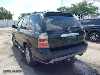 2006 Acura MDX Touring w/Navi with VIN 2HNYD18886H530531, listed as a IAAI auction lot 42045364 with 174,528 mi miles. Bid and sale history available at carsss.com. Image 3.