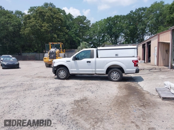 2018 Ford F-150 XL with VIN 1FTMF1CB3JKE51738, listed as a IAAI auction lot 42387561 with 110,951 mi miles and . Bid and sale history available at DreamBid. Image 15.