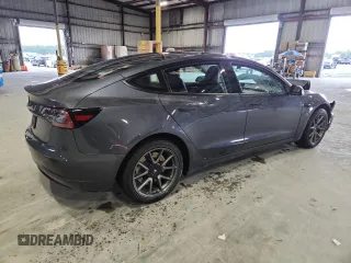 2023 Tesla Model 3 with VIN 5YJ3E1EA4PF554840, listed as a Copart auction lot 63731175 with Not provided miles and Salvage title. Bid and sale history available at DreamBid. Image 3.