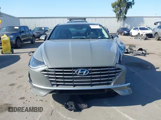 2022 Hyundai Sonata Hybrid Blue with VIN KMHL24JJ1NA041773, listed as a IAAI auction lot 41043553 with 23,696 mi miles. Bid and sale history available at carsss.com. Image 13.