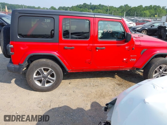 2020 Jeep Wrangler Unlimited Sahara with VIN 1C4HJXEN0LW184564, listed as a IAAI auction lot 42439173 with 79,426 mi miles and . Bid and sale history available at DreamBid. Image 13.