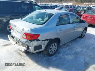 2010 Toyota Corolla with VIN JTDBU4EE3A9098933, listed as a IAAI auction lot 41643811 with 69,806 mi miles. Bid and sale history available at carsss.com. Image 4.