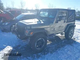 2004 Jeep Wrangler Sahara with VIN 1J4FA59S94P731123, listed as a IAAI auction lot 41288284 with 138,515 mi miles and . Bid and sale history available at DreamBid. Image 17.