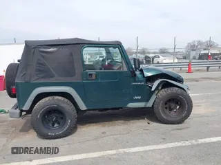 2000 Jeep Wrangler SE with VIN 1J4FA29P0YP728370, listed as a IAAI auction lot 41788463 with 186,995 mi miles. Bid and sale history available at carsss.com. Image 13.