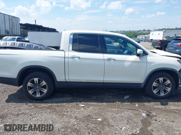 2019 Honda Ridgeline RTL-E with VIN 5FPYK3F71KB017906, listed as a IAAI auction lot 42670476 with 58,288 mi miles and . Bid and sale history available at DreamBid. Image 14.