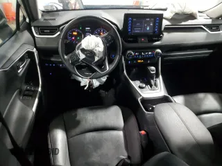 2021 Toyota RAV4 Hybrid LE with VIN 4T3B6RFV0MU050204, listed as a Copart auction lot 50768195 with 76,508 mi miles and Salvage Title. Bid and sale history available at carsss.com. Image 8.