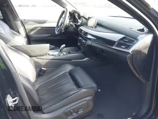 2018 BMW X6 sDrive35i with VIN 5UXKU0C5XJ0G80724, listed as a IAAI auction lot 41274338 with 122,696 mi miles. Bid and sale history available at carsss.com. Image 5.