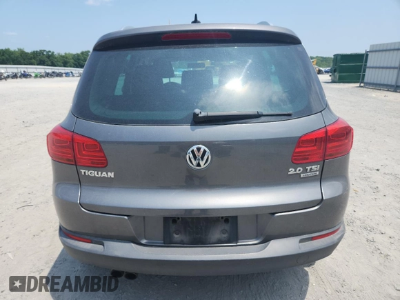 2013 Volkswagen Tiguan SE with VIN WVGBV7AX8DW011356, listed as a Copart auction lot 58099355 with 99,513 mi miles and Salvage title. Bid and sale history available at DreamBid. Image 6.