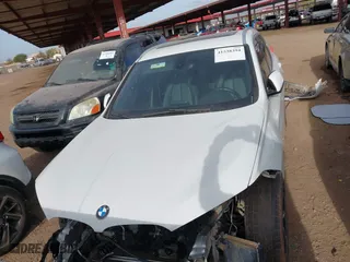 2018 BMW X1 sDrive28i with VIN WBXHU7C32J5H41587, listed as a IAAI auction lot 41538394 with 125,804 mi miles. Bid and sale history available at carsss.com. Image 13.
