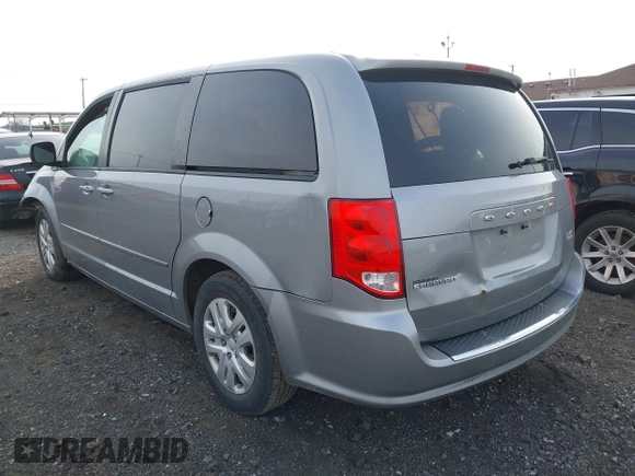 2015 Dodge Grand Caravan SE with VIN 2C4RDGBG8FR612296, listed as a IAAI auction lot 42112920 with 137,023 mi miles and . Bid and sale history available at DreamBid. Image 3.