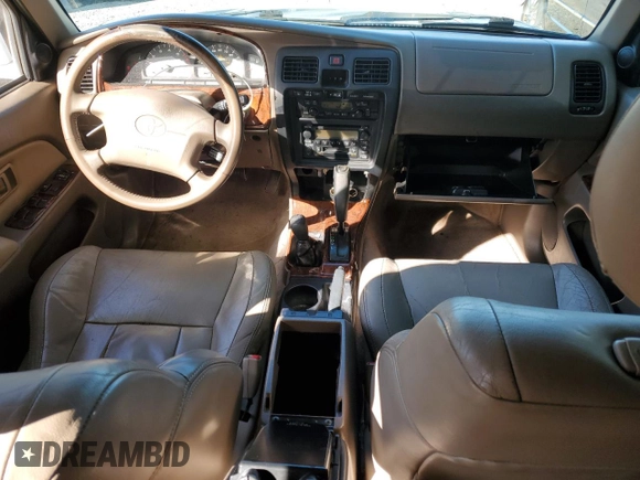 1999 Toyota 4Runner Limited z VIN JT3HN87R1X9024311, wystawiony jako Copart lot #55877715 z przebiegiem 288 859 mil mil oraz Czysty tytuł • Clean title. Historia ofert i sprzedaży dostępna na DreamBid. Obrazek 8.