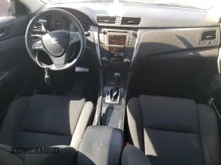 2011 Suzuki Kizashi SE z VIN JS2RE9A34B6111601, wystawiony jako Copart lot #75945784 z przebiegiem 128 926 mil mil oraz Szkoda całkowita • Salvage title. Historia ofert i sprzedaży dostępna na DreamBid. Obrazek 8.