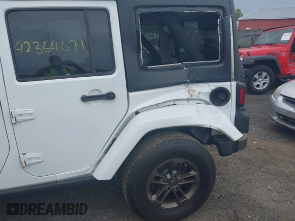 2017 Jeep Wrangler Unlimited 75th Anniversary z VIN 1C4HJWEG8HL502984, wystawiony jako IAAI lot #42354671 z przebiegiem 108 900 mil mil oraz . Historia ofert i sprzedaży dostępna na DreamBid. Obrazek 6.