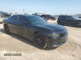 2015 Dodge Charger SXT with VIN 2C3CDXHGXFH896327, listed as a Copart auction lot 55931805 with 204,345 mi miles and Salvage Title. Bid and sale history available at DreamBid. Image 4.