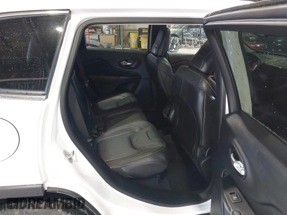 2015 Jeep Cherokee Limited with VIN 1C4PJMDS3FW728884, listed as a IAAI auction lot 41973663 with 112,719 mi miles. Bid and sale history available at carsss.com. Image 8.