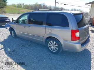 2015 Chrysler Town & Country Touring with VIN 2C4RC1BG7FR552317, listed as a IAAI auction lot 41972396 with Not Provided miles and . Bid and sale history available at carsss.com. Image 3.