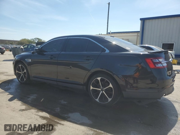 2015 Ford Taurus SEL with VIN 1FAHP2E87FG208522, listed as a Copart auction lot 46700095 with 97,439 mi miles and Salvage title. Bid and sale history available at DreamBid. Image 2.