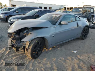 2004 Nissan 350Z Enthusiast with VIN JN1AZ34E74T063248, listed as a Copart auction lot 81887054 with 124,548 mi miles and Salvage Title. Bid and sale history available at carsss.com. Image 1.